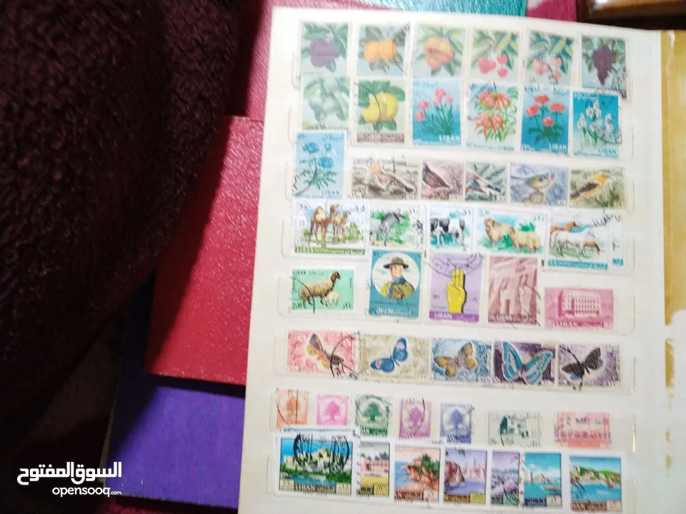 نيشان ملكى وزن41, 41 جرام من الدهب والفضه وعقدفضه من الاحجار الكريمه وطوابع قديمه نادره