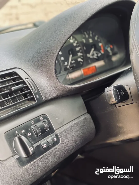 BMW e46 318 2001  بحالة ممتازة جدا