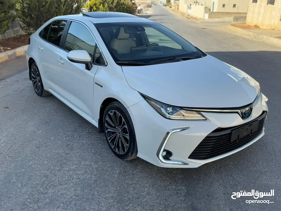 Toyota Corolla 2022 كورولا هايبرد  محرك 1800 cc هايبرد   * تصلح للاعفاءات