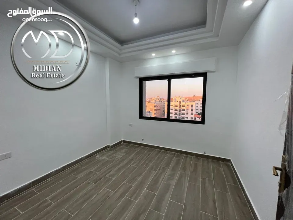 شقة دوبلكس طابق اخير مع روف للبيع عرقوب خلدا مساحة 200م مع تراسات اطلالة رائعة بسعر مميز جداً