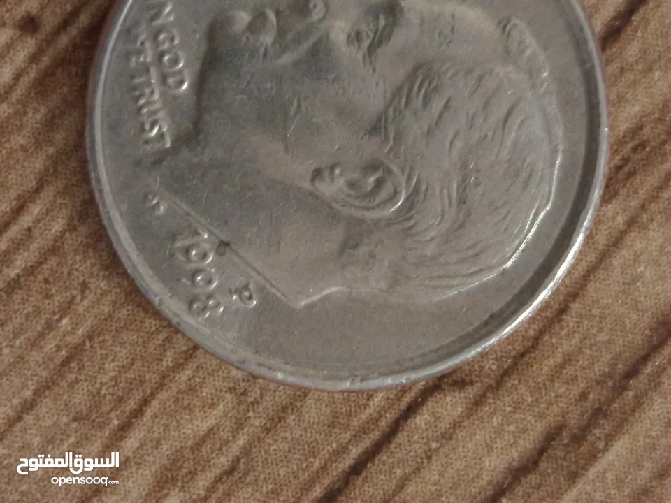 بقيمه اعلى بسبب التضخم المالي باميركا ONE DIME الامريكيه من سنة 1998