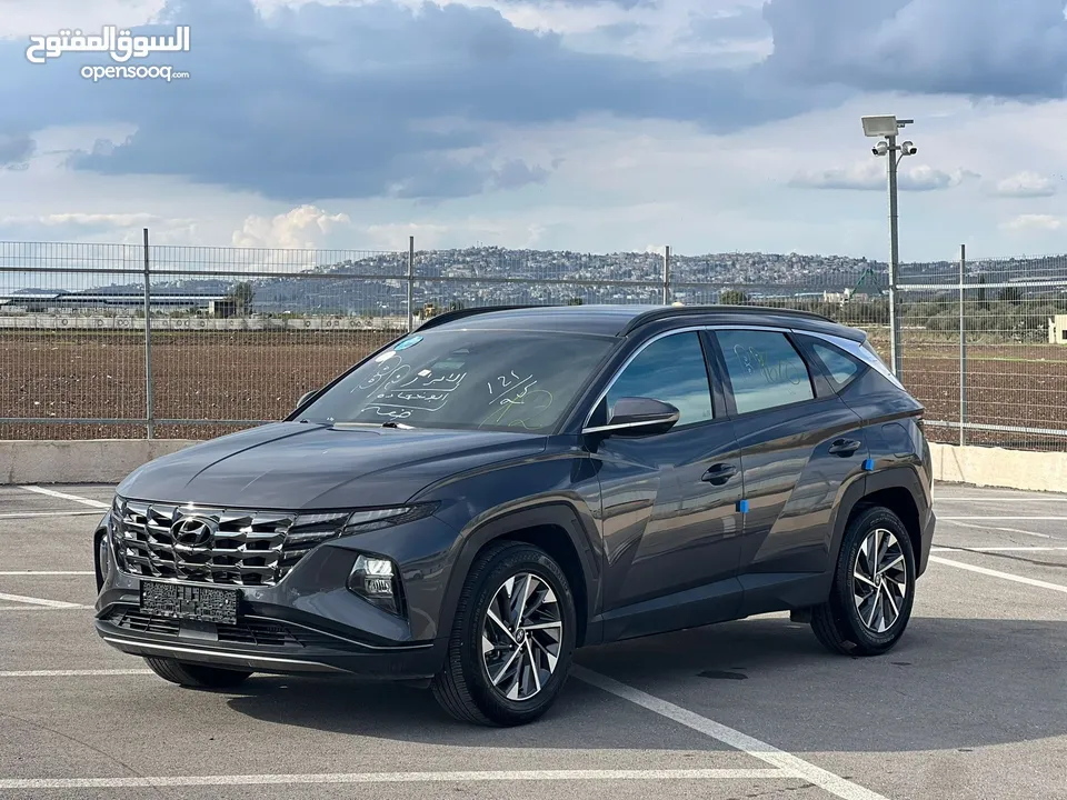 هونداي توسان/2022 فل الفل بدون فتحة سقف  2x4 ///240Hp بنزين + كهرباء  ( Haybrid) 1600cc