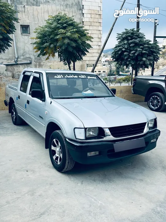 بيك اب ايسوزو 2003 KB / جمرك جديد /  اقساط دفعه أولى 2500