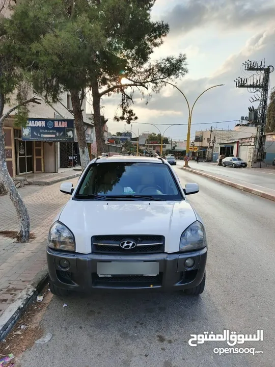 جب توسان 2005بصلاة على النبي الجب بوضعية ممتازة قوة متور 2000 +16صباب مو 20 متور وجير ممتاز