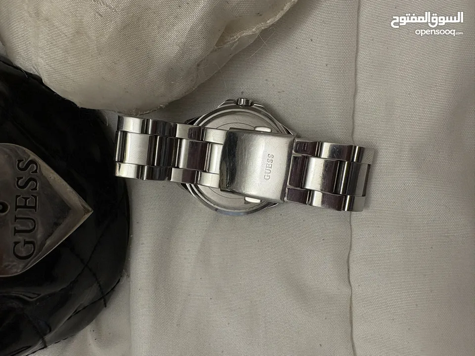 ساعه guess اصليه لون فضي