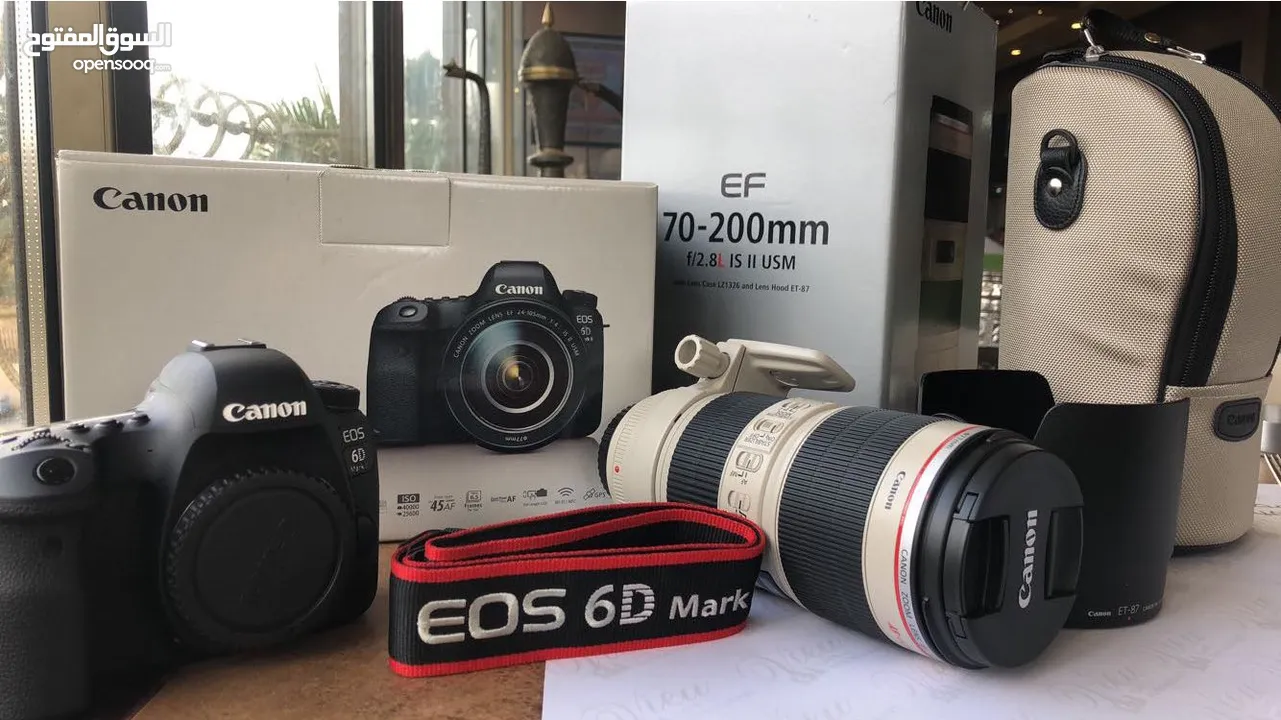 كميرا كانون 6d mark ii مع عدستها الفخمه بسعر حرق ونظيفة جدا