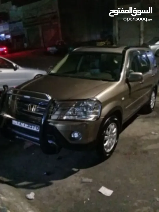 هوندا CR V فحص 2جيد خلفي وأمامي مضروب علا راس الجب بحاله ممتازه ولا بحاجه اي من الصيانه بس شعر وروح