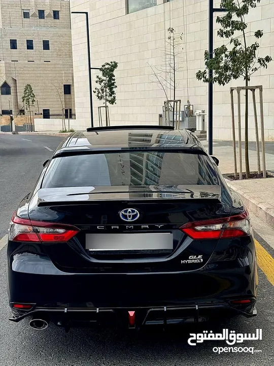 تويوتا كامري 2021 فل كامل مع فتحة فحص كامل 7 جيد كرت ابيض بحالة الشركة