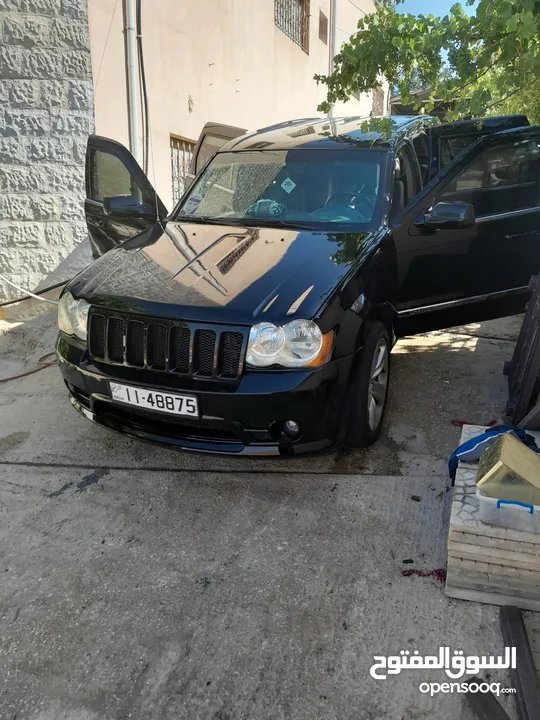 جيب شيروكي 2005 محول  srt 2010 لون اسود 4&4 فل ما عدا الفتحه فحص جيد قصعات ترخيص وتأمين لتاريخ 8\15