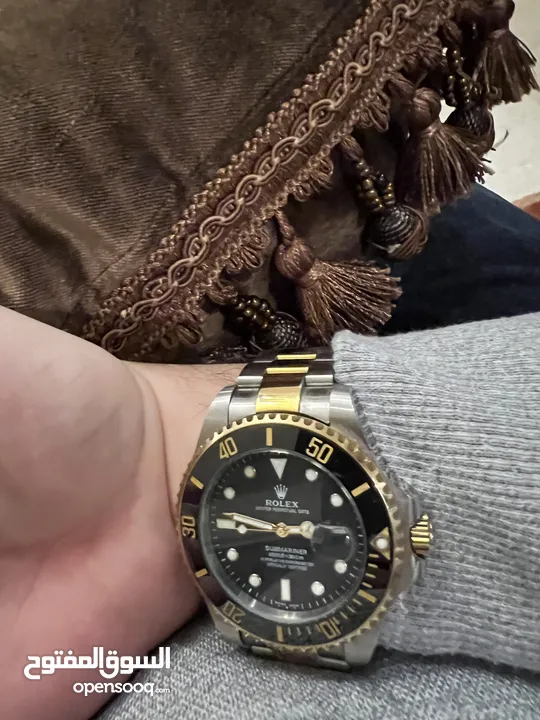 ساعة Rolex Submariner Silver and Gold Oyster Bracelet wBlack Bezel فيرست كوبي