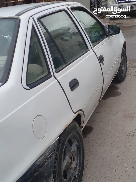 سيارة دايو نوع سلو موديل 1996 لون ابيض كير عادي