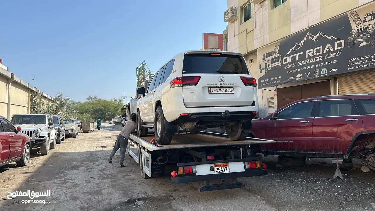 سطحة مدينة حمد 24 Hamad Town TOWING CAR 24 ونش رافعة رافعه نقل سطحة البحرين خدمات سحب سيارات
