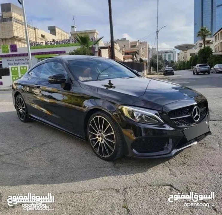 مرسيدس C180 كوبيه بحالة الوكالة AMG كت اصلي وارد غرغور