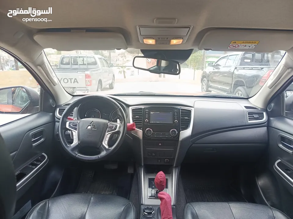 ميتسوبيشي سبيرتيرو L200 2021  فحص كامل (3/كاميرات) يمكن التمويل عن طريق المعرض بدفعه أولى 11000 الف