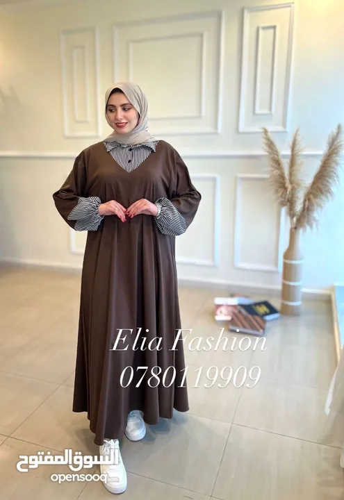 فستان مقلم او عباي سعرها 12