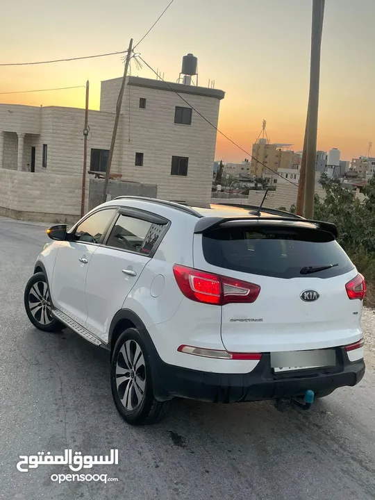 سبورتاج فل الفل فتحه بانورما كل السقف ضواو ليدات قدام ورا  كراسي جلد  صيانه دوريه