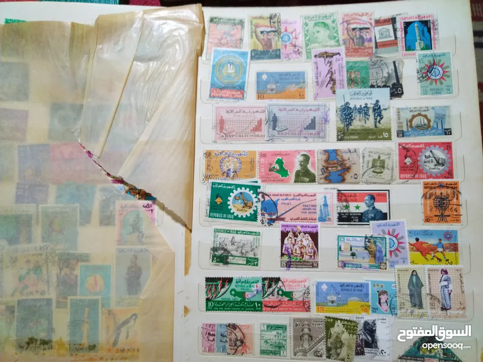 نيشان ملكى وزن41, 41 جرام من الدهب والفضه وعقدفضه من الاحجار الكريمه وطوابع قديمه نادره