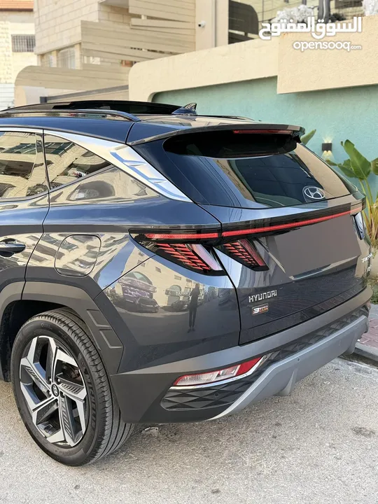 هونداي توسان 2022 هايبرد plug in 4*4 فل اضافات مع بانوراما 271 حصان