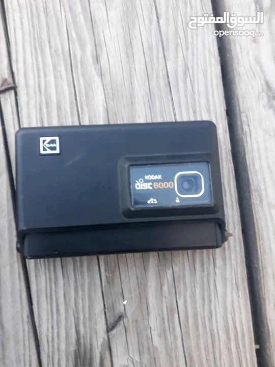 polarid sx70 & OLYMPUS & KODAK DISC