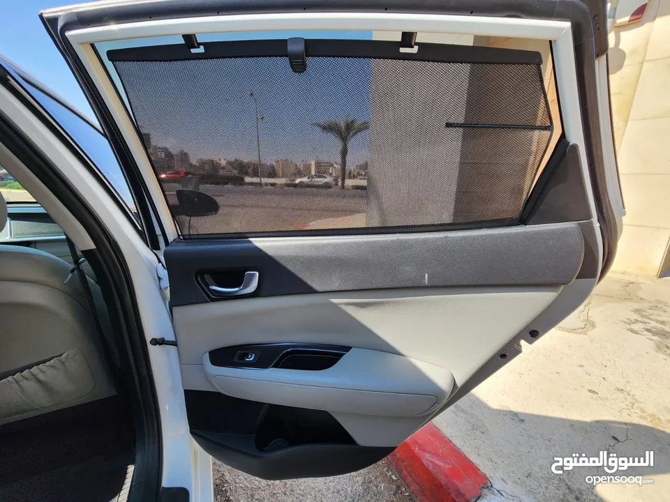 Kia Optima 2018 — لون أبيض لؤلؤي تحفة