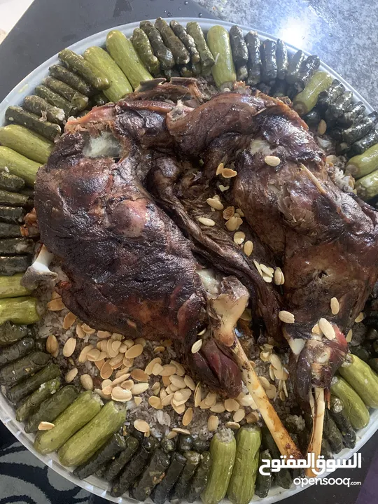 خروف مشوي او محشي او محشي ورق عنب دوالي