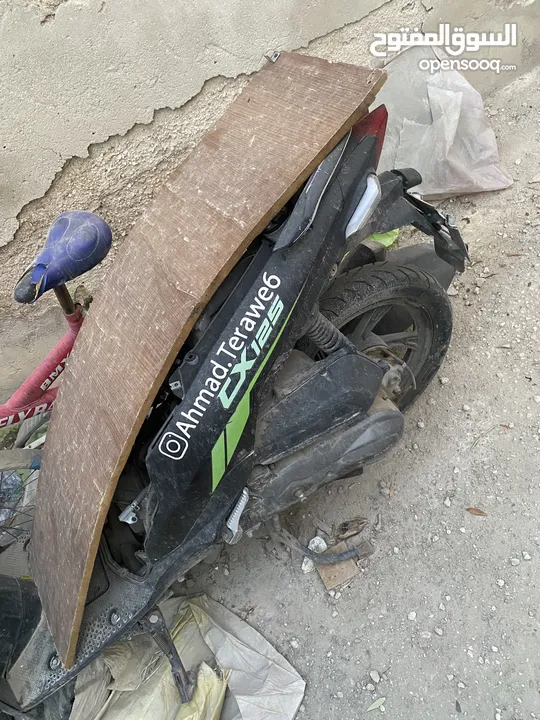 سكوتر Qj للبيع كاش بحاجة إلى صيانة