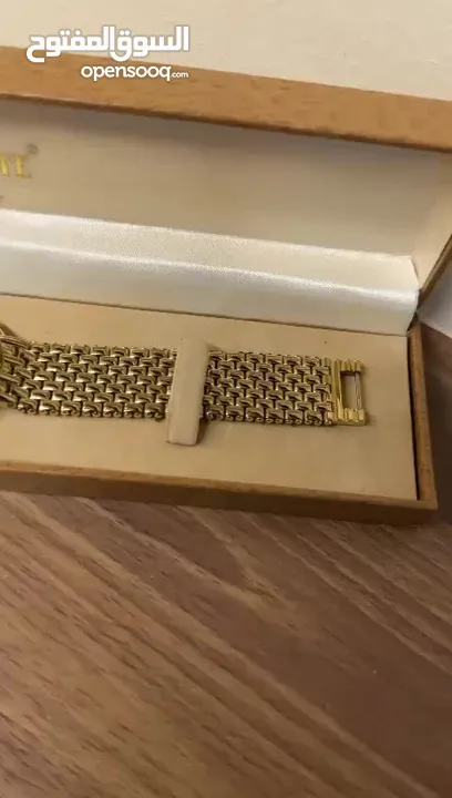 ساعة اكيوريت سويسرية مطلية بالذهب عيار 22 سويسرية الصنع مقاومة للمياه