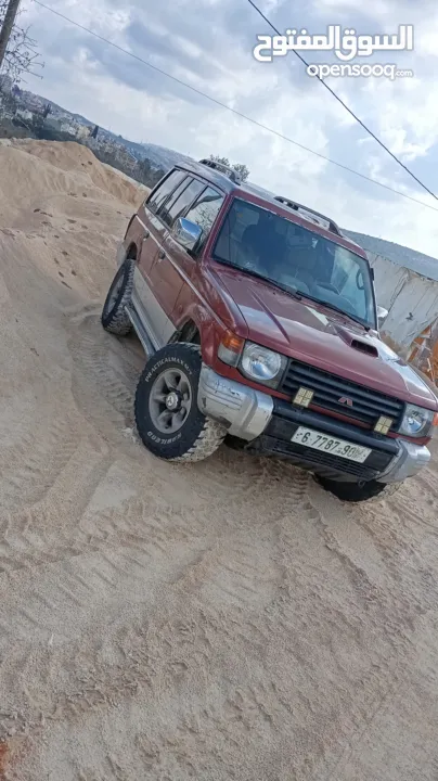 ميتسوبيشي باجيو1999  جير اتوماتيك 7 ركاب غرفه جلد عسليه  جير ومطور جاد مركبات