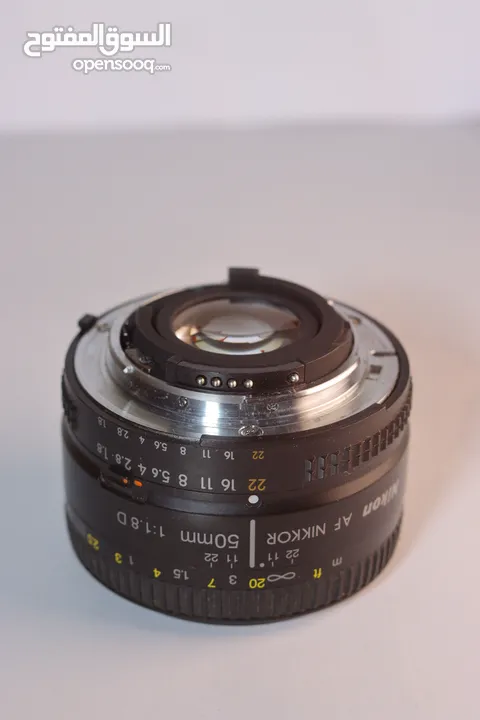 عدسة نيكون 50 - 1.8 D  نظيفة جدا  lens Nikon 50 d 1.8  very clean