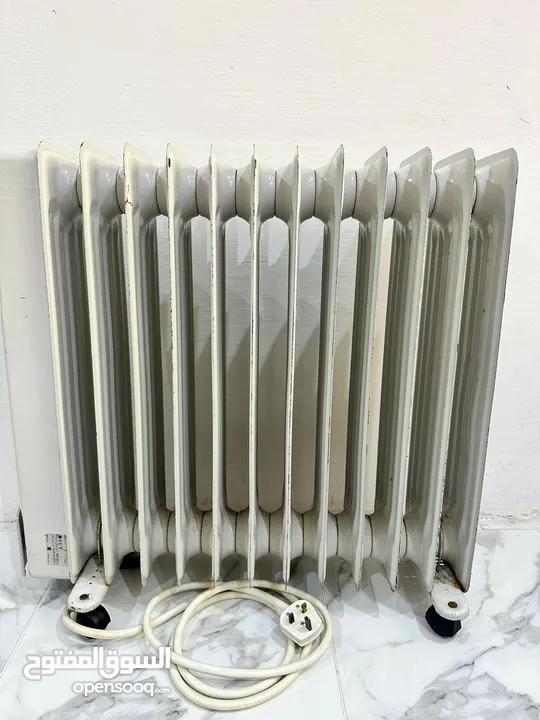 12 FIN Oil Heater,  in good condition