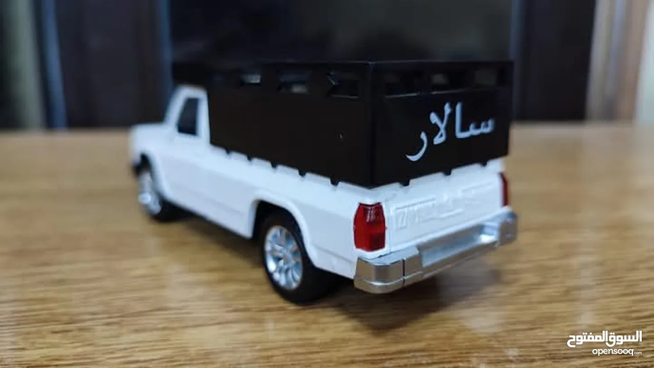 مجسم بكم جونيور حديد قياس 1/32 بفتح ابواب وكاله