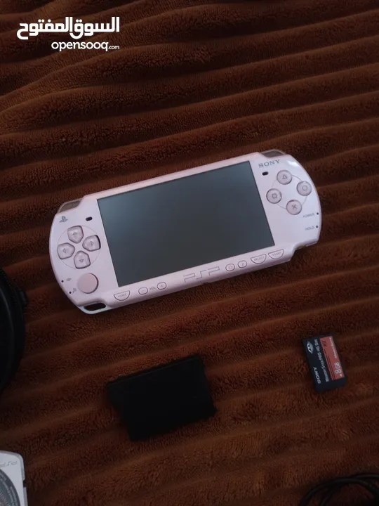 Psp portal لون زهري مع كامل أغراضها