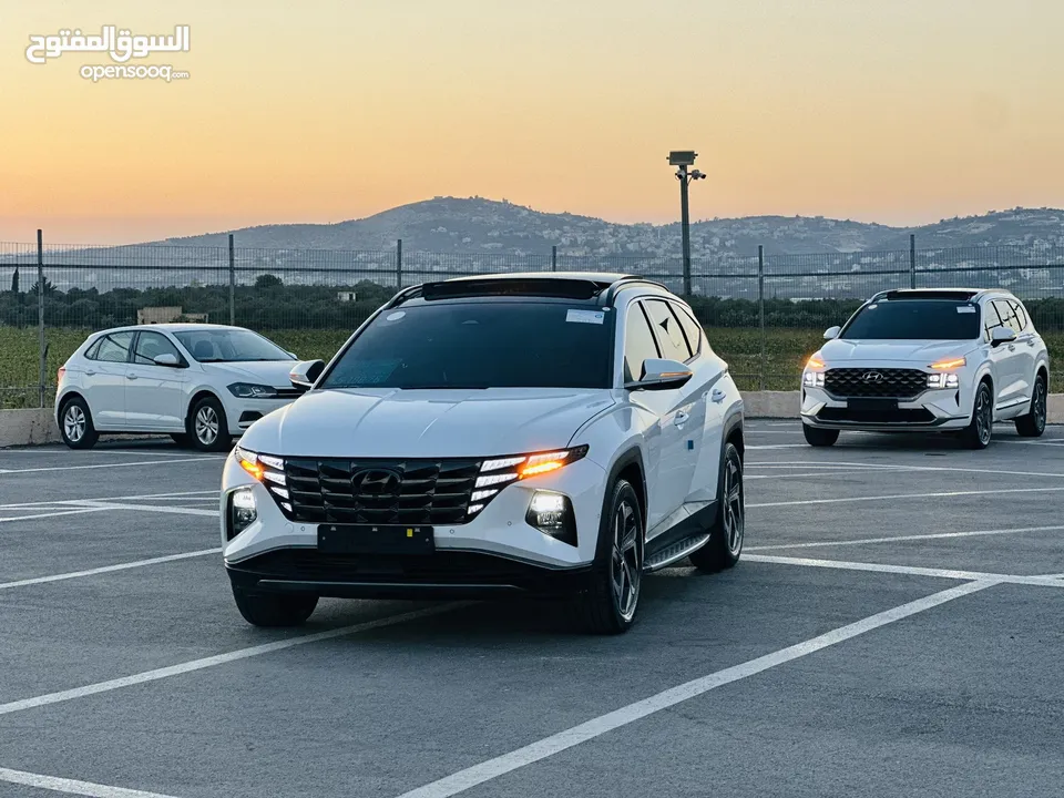 هونداي توسان/2024  فل الفل فتحة سقف بانوراما  2x4 ///240Hp بنزين + كهرباء  ( Haybrid) 1600cc