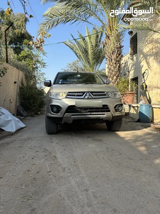 تندر متسبيشي L200 دفع خلفي 4x2 الحالة نظيف و السعر قابل لتفاوض مطور قير نظاف نظاف