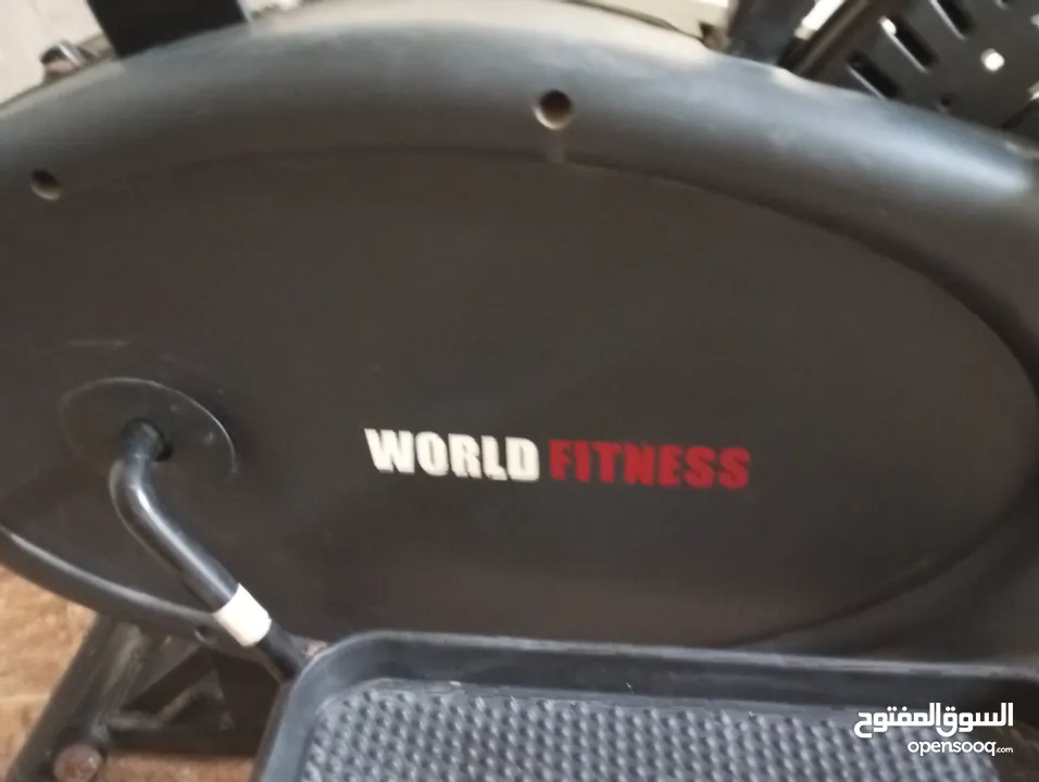 جهاز كروس و بسكليت رياضي بنفس الوقت امريكي شركة World Fitness النوع المستخدم الاندية الرياضية