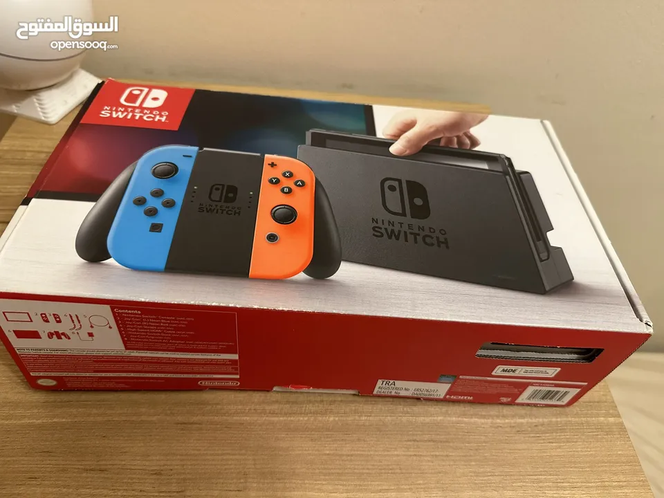 Nintendo switch brand new! No scratches,clean( comes with 3 games fifa 18,CNBC, SuperMarioOdyssey)