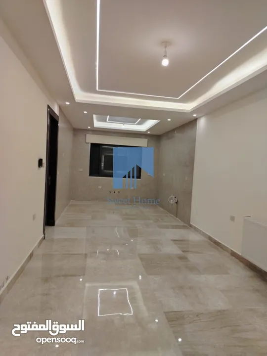 شقة أرضية فاخرة للبيع في خلدا - قرب إشارة الدر المنثور 140م مع حديقة وترسات 70م لم تسكن