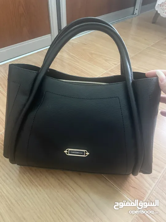 chris bella black leather purse for women. شنتة/شنطة/حقيبة كريس بيلا جلد اسود نسائية حجم كبير جديدة