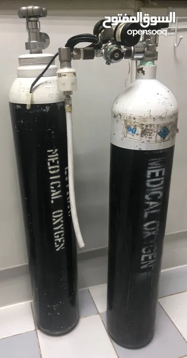 2 Oxygen cylinders with oxygen