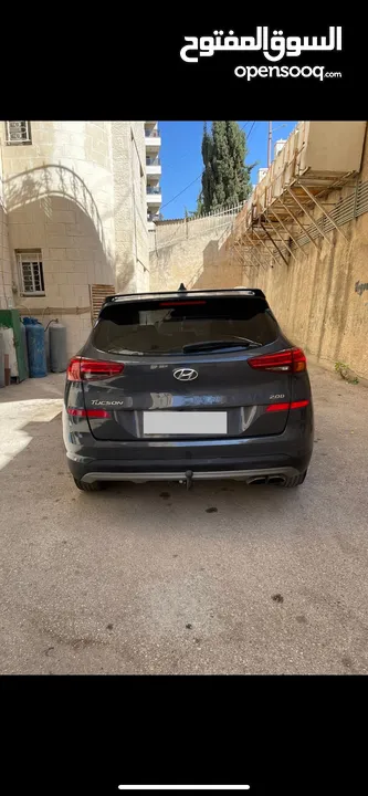 Hyundai Tucson بويه شركه فللللللل عدا فتحه  ب الورقه 5 عدسات led  بصمه  هوك