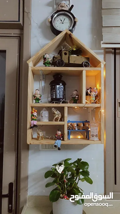 مكتبة كتب من الخشب والحبل  أشغال يدوية للبيت