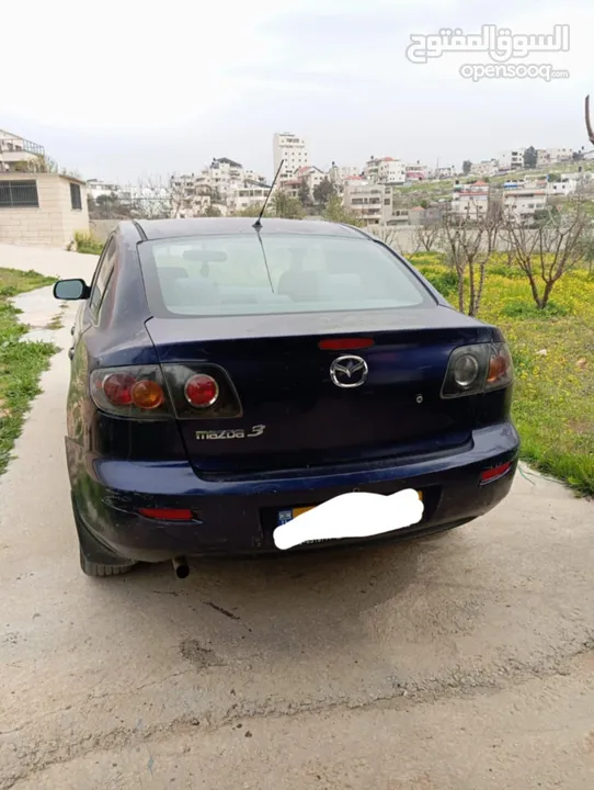 مازدا شلوش مشطوب متور قير جداد  شاشه  جنط مغنيسيوم  حبتها عليها  هيئه