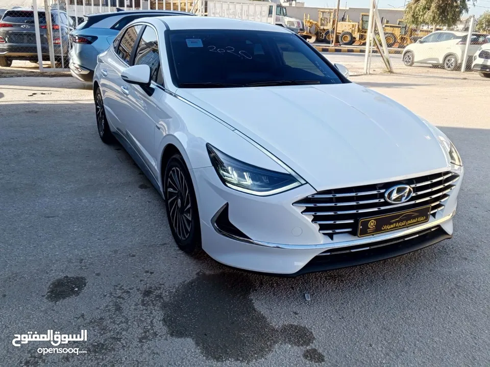 SONATA HYBRID 2020 ابيض لؤلؤي كوري  عداد 32 الف كيلو