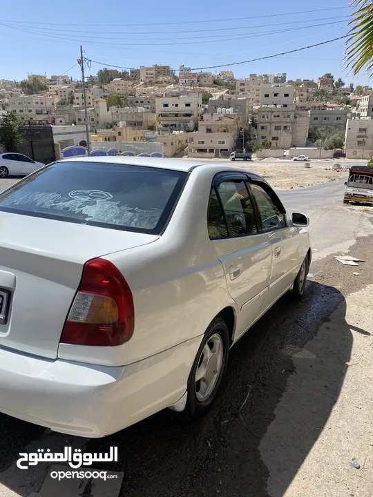 هيونداي فيرنا لون ابيضّ مميز موديل 1999