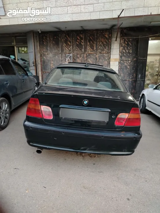للبيع Bmw e46 2004  لون اخضر زيتي بجننن مع فتحة  دهان جديد السيارة كرتونة