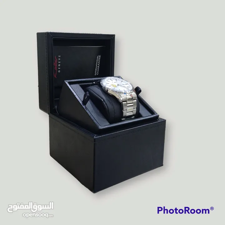 ساعة من كولبر جينيف Kolber GENEVE فضية معدنية خاصة، إصدار مخصص لجامعة السلطان قابوس.