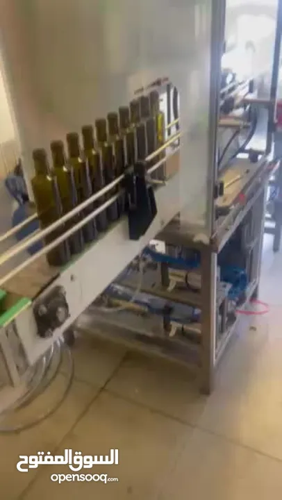 ماكنة تعبئة سوائل Liquids Filling  لأصحاب المصانع والمعامل والمشاريع الصغيرة Machine