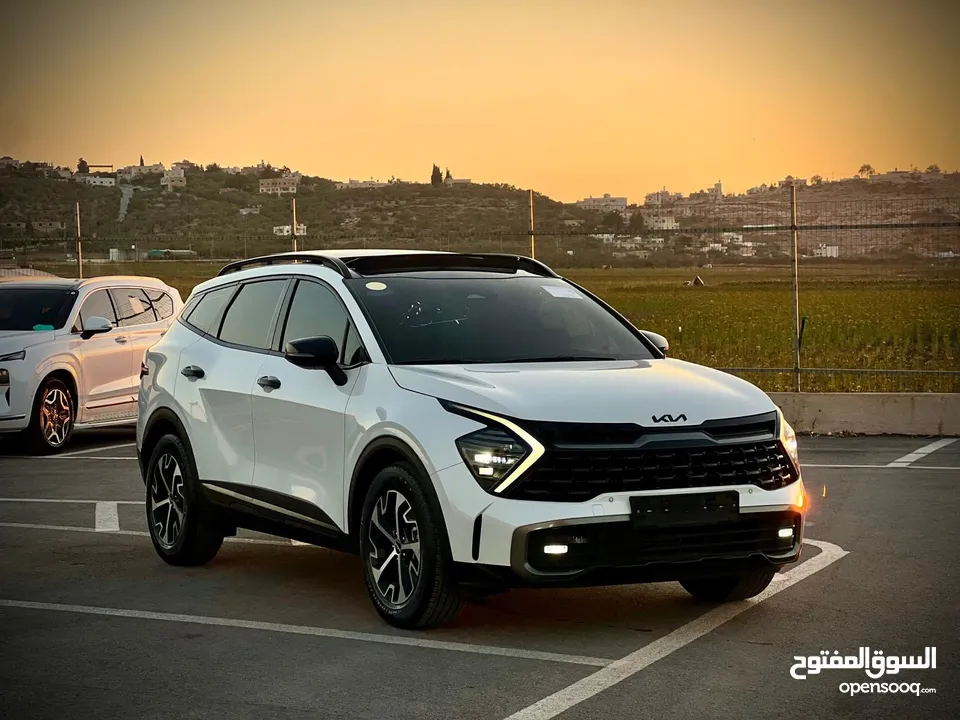 كايا سبورتاج /2022 فل الفل فتحة سقف  2x4 ///240Hp بنزين + كهرباء  ( Haybrid) 1600cc