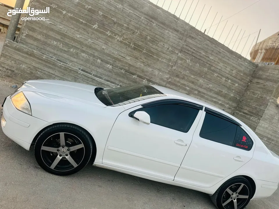 سكودا نيو 2006 دهان جديد  فحص ممتاز وتخلو من القص والضربات هيئه جديد فرش جلد  شاشه اندرو
