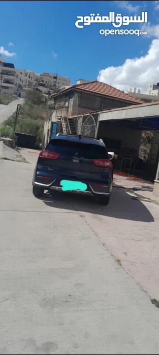 كيا نيرو 2017 مع فتحه جنط 18  تسير 11_2017  81 الف شيكل